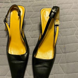 Coach sling dress shoe.Strap has been reinforced & new caps on heels.